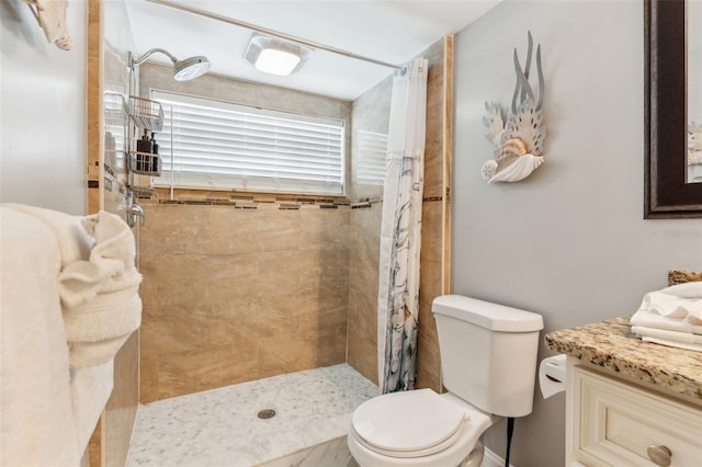 1818 Indian Rocks Rd S, Largo, FL 33774 - bathroom with toilet, tiled shower, and vanity