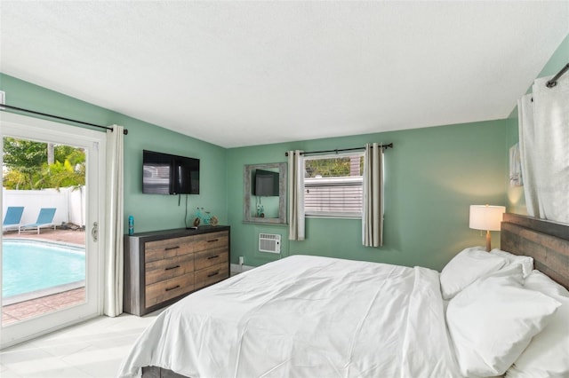1818 Indian Rocks Rd S, Largo, FL 33774 - bedroom featuring access to exterior and a wall mounted air conditioner