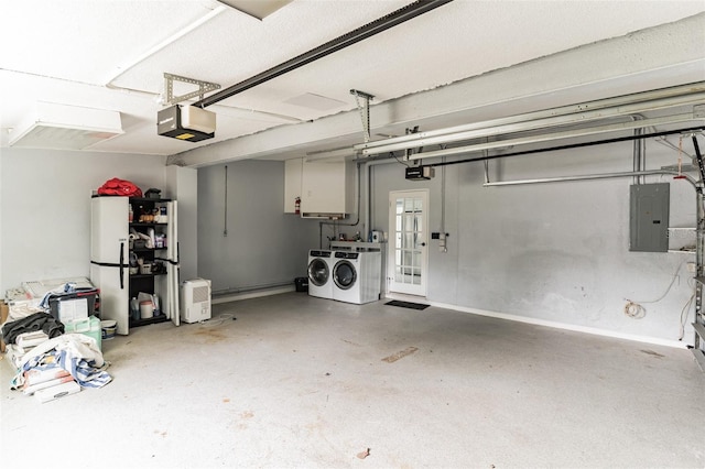 1818 Indian Rocks Rd S, Largo, FL 33774 - garage with washing machine and dryer, electric panel, and a garage door opener
