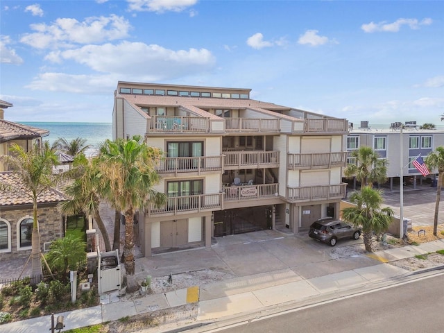 view of apartment building / complex featuring a water view