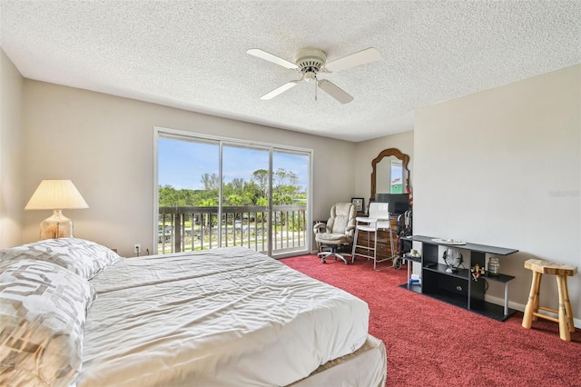 bedroom with access to outside, a textured ceiling, carpet, and ceiling fan