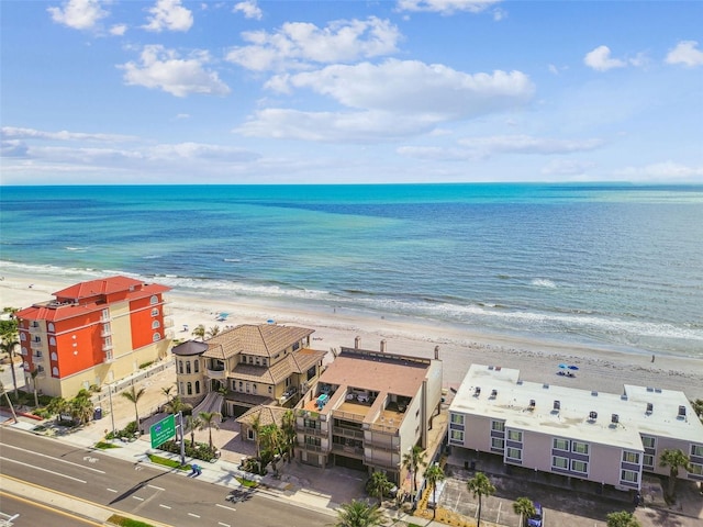 aerial view of waterfront with a beach