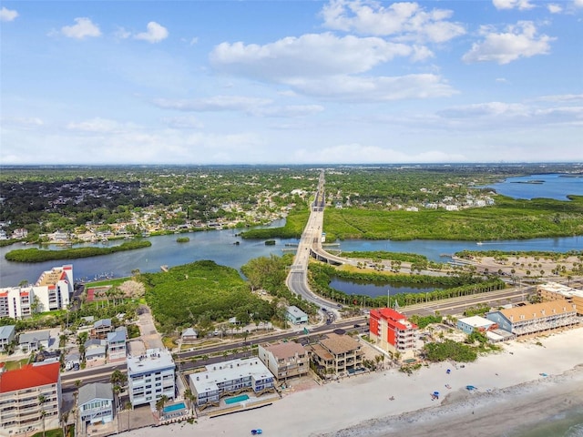 aerial view of a nearby body of water and a notable bridge