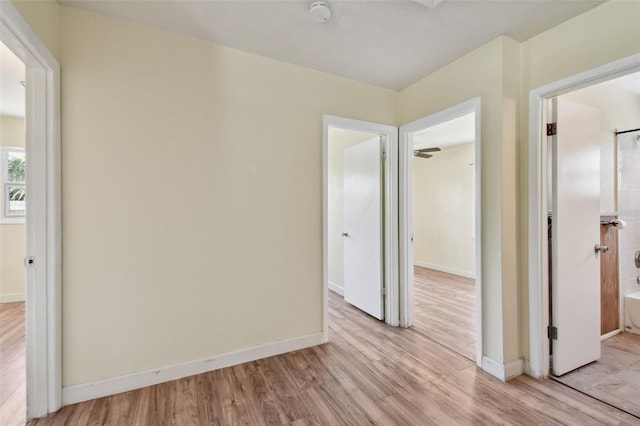 1810 77th Ave N, Saint Petersburg, FL 33702 - unfurnished bedroom featuring light wood-style flooring and baseboards