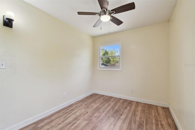 1810 77th Ave N, Saint Petersburg, FL 33702 - unfurnished room featuring light wood-style flooring, baseboards, and ceiling fan