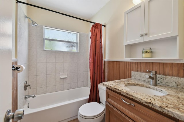 1810 77th Ave N, Saint Petersburg, FL 33702 - bathroom with shower / bath combination with curtain, toilet, a wainscoted wall, vanity, and wooden walls
