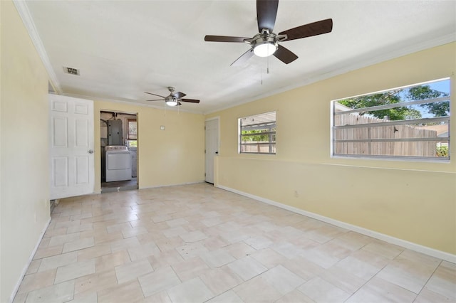 1810 77th Ave N, Saint Petersburg, FL 33702 - unfurnished room with washer / clothes dryer, electric panel, crown molding, a ceiling fan, and baseboards