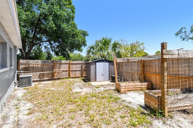 1810 77th Ave N, Saint Petersburg, FL 33702 - fenced backyard featuring central AC unit, a shed, a vegetable garden, and an outdoor structure