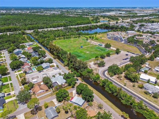 1810 77th Ave N, Saint Petersburg, FL 33702 - aerial view of property and surrounding area with a nearby body of water and nearby suburban area