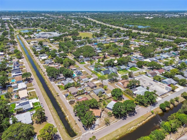 1810 77th Ave N, Saint Petersburg, FL 33702 - aerial view of property's location with a nearby body of water and nearby suburban area