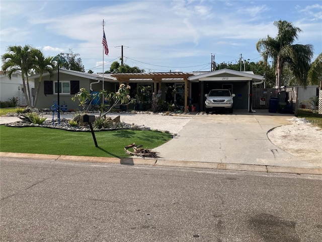 2912 Case Ave, Bradenton, FL 34207 - ranch-style home with driveway, a front yard, and a carport