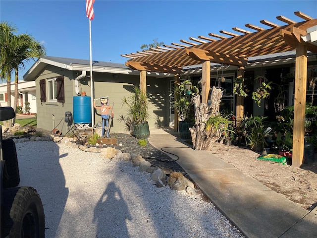 2912 Case Ave, Bradenton, FL 34207 - view of front of house featuring concrete block siding and a pergola