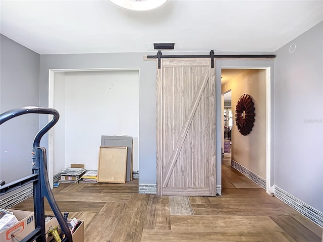 2912 Case Ave, Bradenton, FL 34207 - exercise area with a barn door and wood finished floors