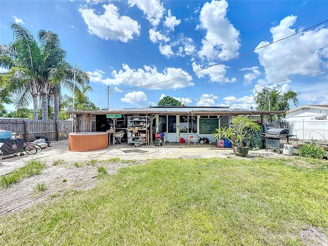 2912 Case Ave, Bradenton, FL 34207 - back of property with a patio area and a fenced backyard