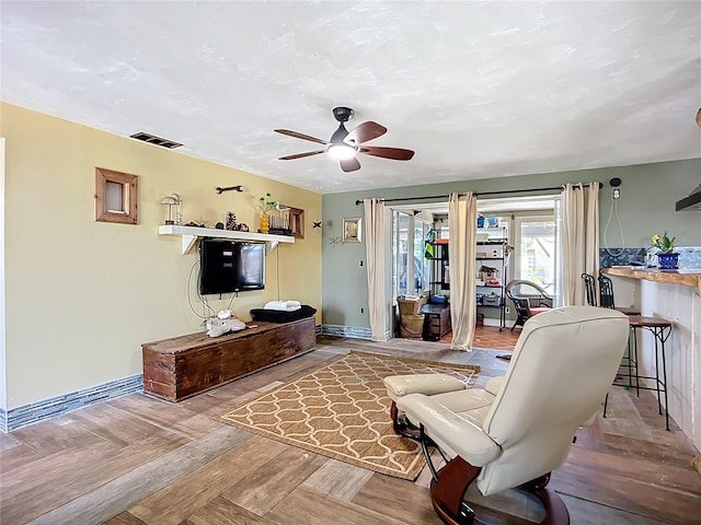 2912 Case Ave, Bradenton, FL 34207 - living room featuring ceiling fan and wood finished floors