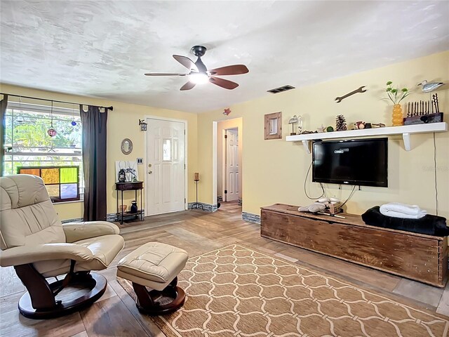 2912 Case Ave, Bradenton, FL 34207 - living area featuring wood finished floors and ceiling fan