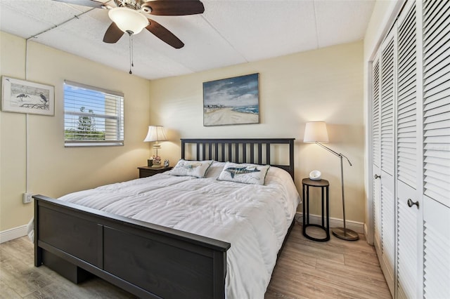 1 Boca Ciega Point Blvd Unit 310, Saint Petersburg, FL 33708 - bedroom with light wood-style floors, baseboards, and a closet