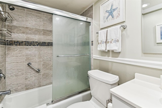 1 Boca Ciega Point Blvd Unit 310, Saint Petersburg, FL 33708 - bathroom featuring enclosed tub / shower combo, toilet, and vanity