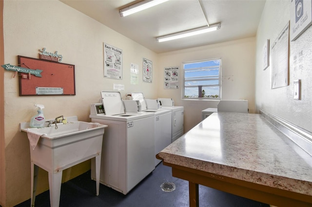 1 Boca Ciega Point Blvd Unit 310, Saint Petersburg, FL 33708 - communal laundry room with washer and clothes dryer
