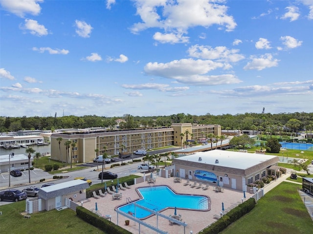 1 Boca Ciega Point Blvd Unit 310, Saint Petersburg, FL 33708 - community pool with a patio and view of scattered trees