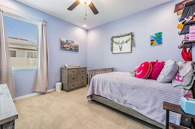 carpeted bedroom featuring baseboards, a ceiling fan, and recessed lighting