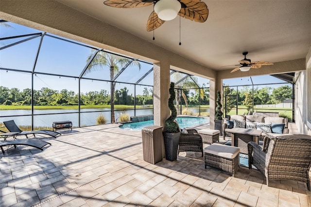 view of patio with a ceiling fan, an outdoor pool, a water view, an outdoor hangout area, and a lanai
