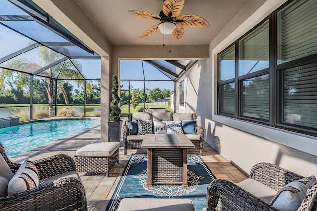 view of patio with an outdoor living space, an outdoor pool, a ceiling fan, and glass enclosure