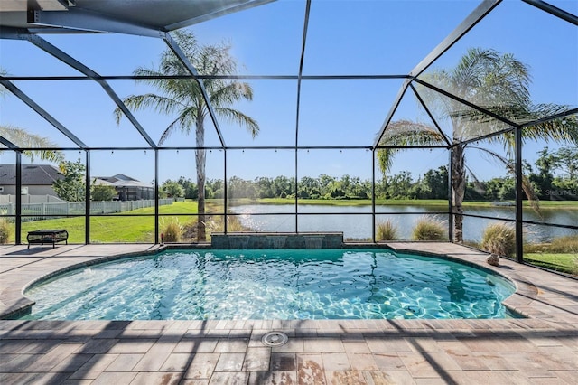 outdoor pool with a water view and a lanai