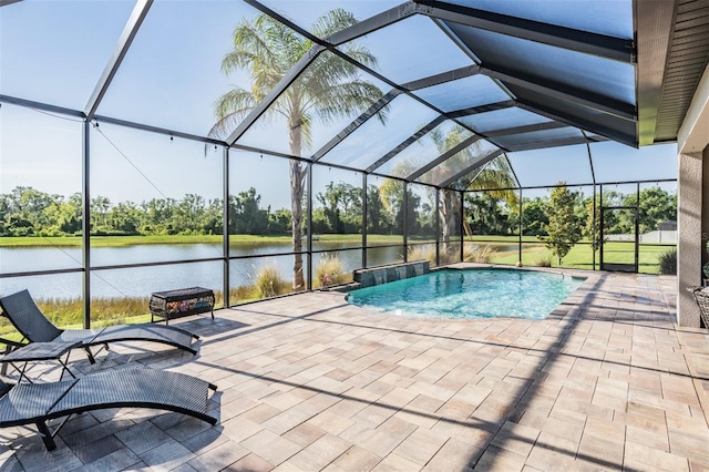 swimming pool with a patio area, a water view, and a lanai