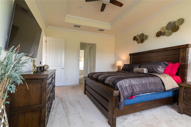 4888 Sevilla Shores Dr, Wimauma, FL 33598 - bedroom featuring a raised ceiling, light colored carpet, crown molding, ceiling fan, and baseboards