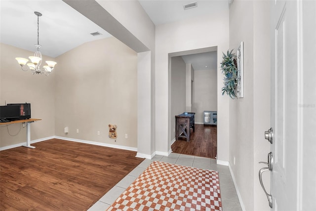 11808 Holly Crest Ln, Riverview, FL 33569 - tiled entryway with a chandelier and baseboards
