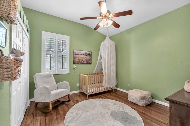 11808 Holly Crest Ln, Riverview, FL 33569 - bedroom with wood finished floors, baseboards, ceiling fan, and a closet