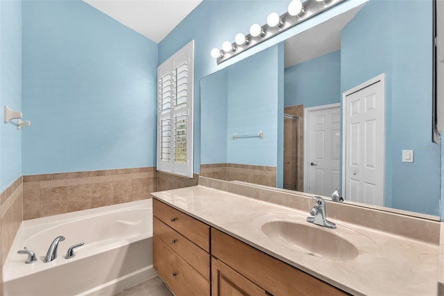 11808 Holly Crest Ln, Riverview, FL 33569 - full bath featuring vanity, a bath, and a stall shower