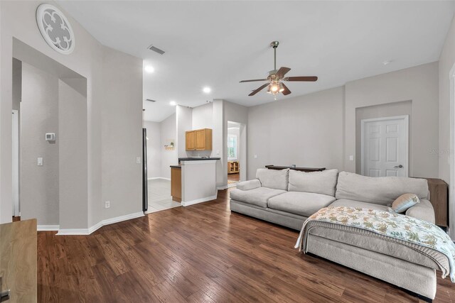 11808 Holly Crest Ln, Riverview, FL 33569 - living room featuring a ceiling fan, wood finished floors, and baseboards