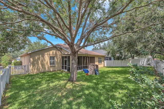 11808 Holly Crest Ln, Riverview, FL 33569 - back of property featuring stucco siding and a sunroom