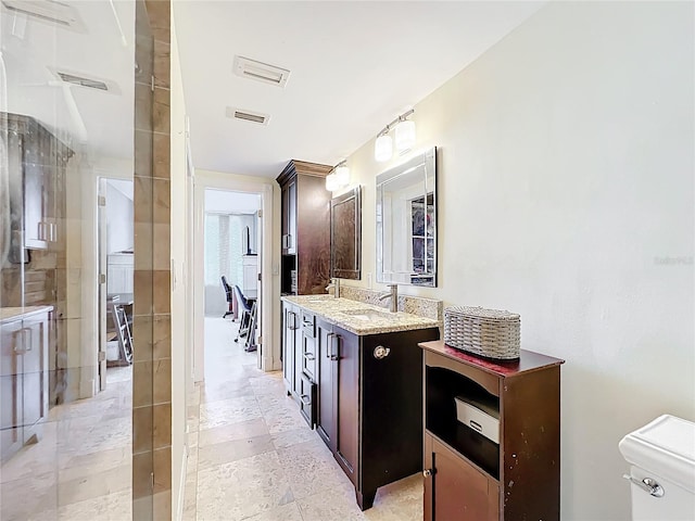 100 Pierce St Unit 910, Clearwater, FL 33756 - full bathroom featuring vanity and toilet