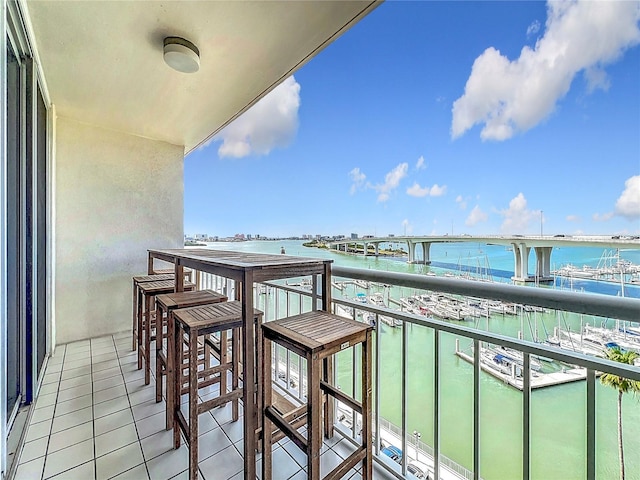100 Pierce St Unit 910, Clearwater, FL 33756 - balcony with a water view and view of marina