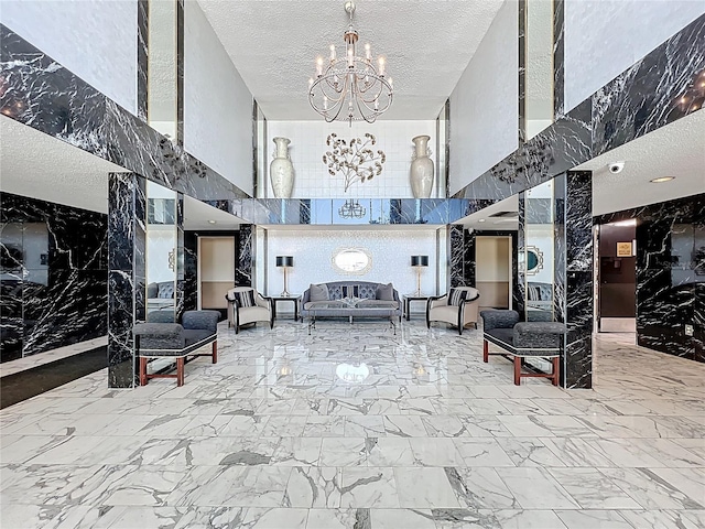 100 Pierce St Unit 910, Clearwater, FL 33756 - community lobby featuring a towering ceiling and a textured ceiling