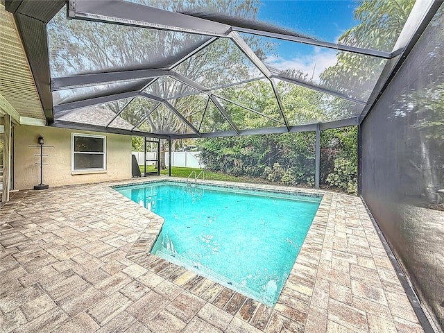 3093 Hillside Ln, Safety Harbor, FL 34695 - swimming pool featuring a patio, a lanai, and a fenced backyard