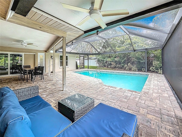3093 Hillside Ln, Safety Harbor, FL 34695 - swimming pool featuring a ceiling fan, outdoor lounge area, a patio area, and outdoor dining space