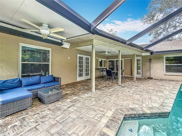 3093 Hillside Ln, Safety Harbor, FL 34695 - view of patio with french doors, ceiling fan, outdoor lounge area, an outdoor pool, and glass enclosure