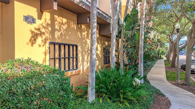 200 4th Ave S Unit 229, Saint Petersburg, FL 33701 - property entrance featuring stucco siding
