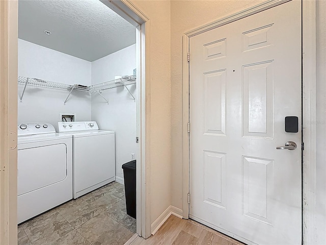 200 4th Ave S Unit 229, Saint Petersburg, FL 33701 - laundry room featuring washer and clothes dryer and baseboards