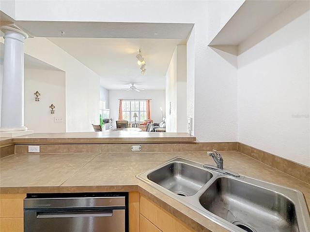 200 4th Ave S Unit 229, Saint Petersburg, FL 33701 - kitchen featuring a sink, decorative columns, dishwasher, a ceiling fan, and light brown cabinetry