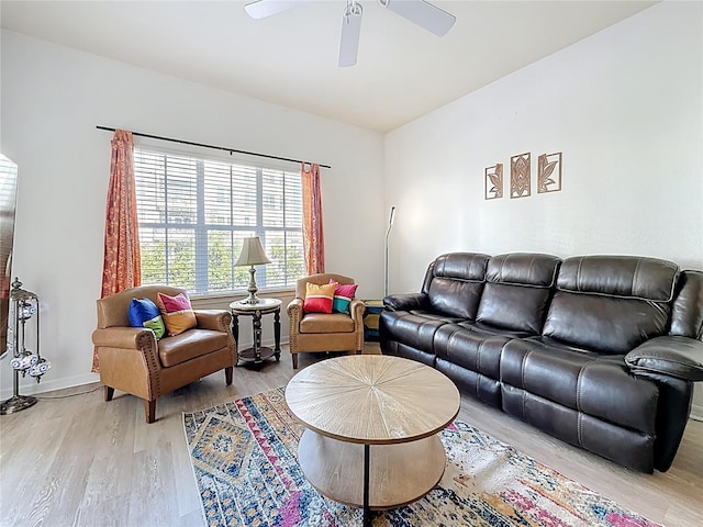 200 4th Ave S Unit 229, Saint Petersburg, FL 33701 - living room featuring light wood-type flooring, ceiling fan, and baseboards
