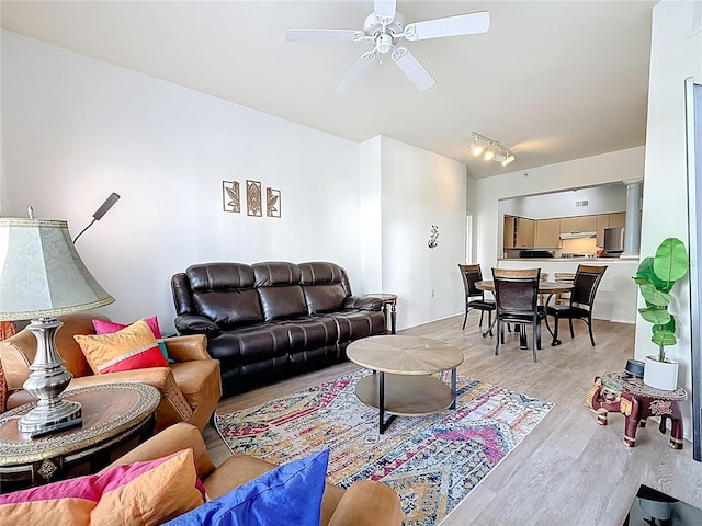 200 4th Ave S Unit 229, Saint Petersburg, FL 33701 - living area featuring light wood finished floors, ceiling fan, and rail lighting