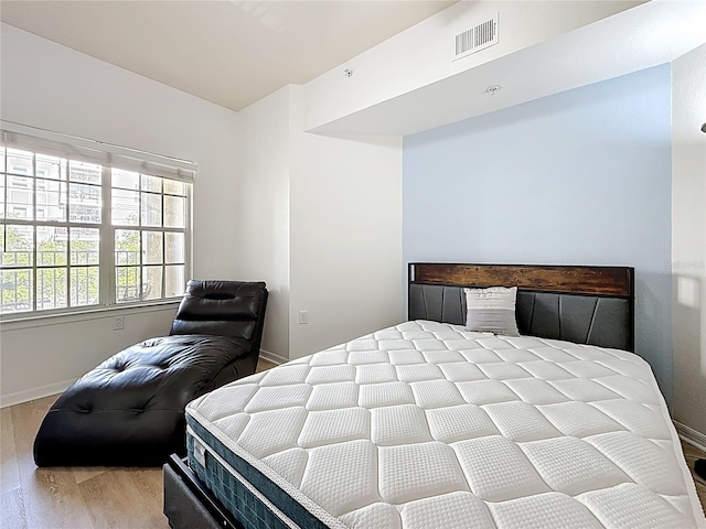 200 4th Ave S Unit 229, Saint Petersburg, FL 33701 - bedroom with wood finished floors and baseboards