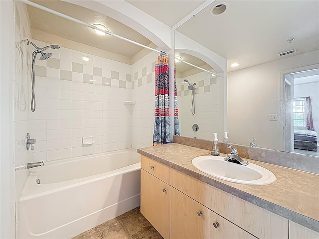200 4th Ave S Unit 229, Saint Petersburg, FL 33701 - bathroom featuring tub / shower combination, vanity, and tile patterned floors