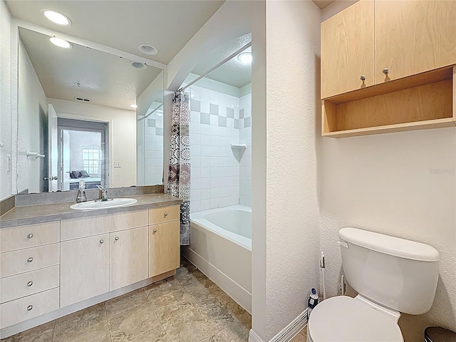 200 4th Ave S Unit 229, Saint Petersburg, FL 33701 - full bathroom featuring toilet, vanity, shower / bath combo, baseboards, and recessed lighting
