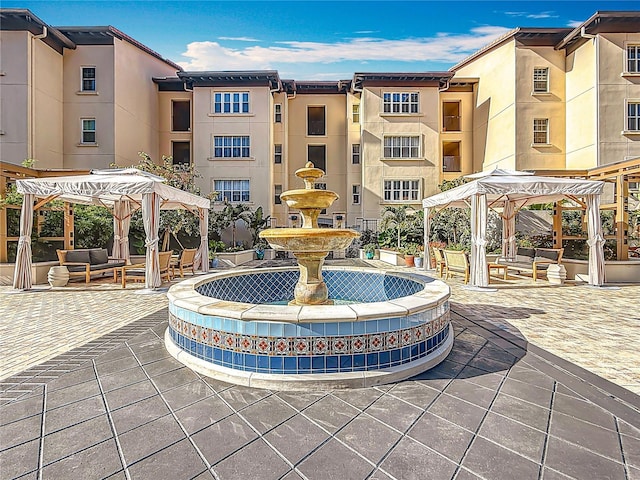 200 4th Ave S Unit 229, Saint Petersburg, FL 33701 - view of home's community with a gazebo, a pergola, and a patio
